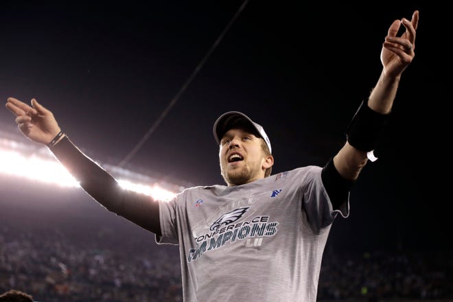 Eagles quarterback Nick Foles celebrates the team's NFC championship victory over the Minnesota Vikings Sunday. Foles went 26 for 33 in passing for 352 yards and three touchdowns. [MATT SLOCUM / THE ASSOCIATED PRESS]