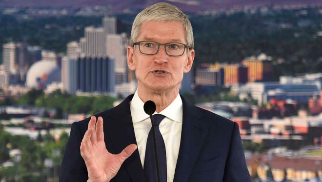 Apple CEO Tim Cook speaks during his visit to Reno, Nev., for a ceremony celebrating a new Apple warehouse on Wednesday, Jan. 17, 2018. (Andy Barron/The Reno Gazette-Journal via AP)