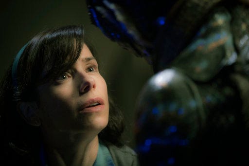 This image released by Fox Searchlight Pictures shows Sally Hawkins, left, and Doug Jones in a scene from the film "The Shape of Water." "Star Wars: The Last Jedi," "Get Out," ''Lady Bird," ''The Shape of Water" and "Three Billboards Outside Ebbing, Missouri" are among the nominees for AARP The Magazine's 17th annual Movies for Grownups Awards. The Feb. 5 ceremony will be held in Los Angeles. It will air on PBS' "Great Performances" on Feb. 23. (Kerry Hayes/Fox Searchlight Pictures via AP)