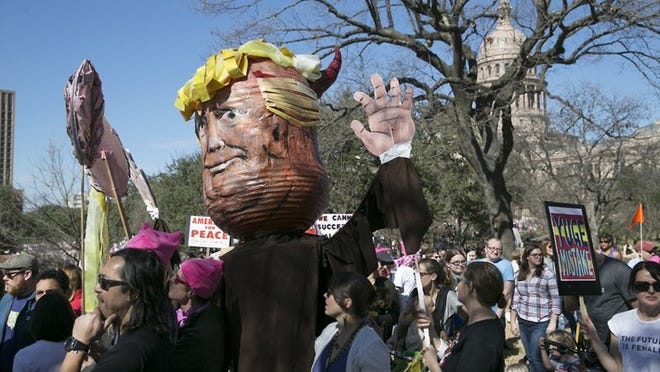 An effigy of President Donald Trump is carried through the Capitol grounds during the march. Thousands attended the Women’s March on Austin Saturday afternoon January 21, 2017, joining other movements across the country to stands up for women’s rights. RALPH BARRERA/AMERICAN-STATESMAN