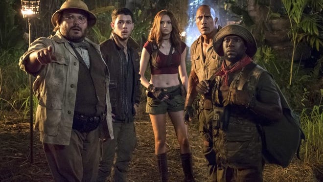 Jack Black, from left, Nick Jonas, Karen Gillan, Dwayne Johnson and Kevin Hart star in “Jumanji: Welcome to the Jungle.” Contributed by Frank Masi/Sony Pictures