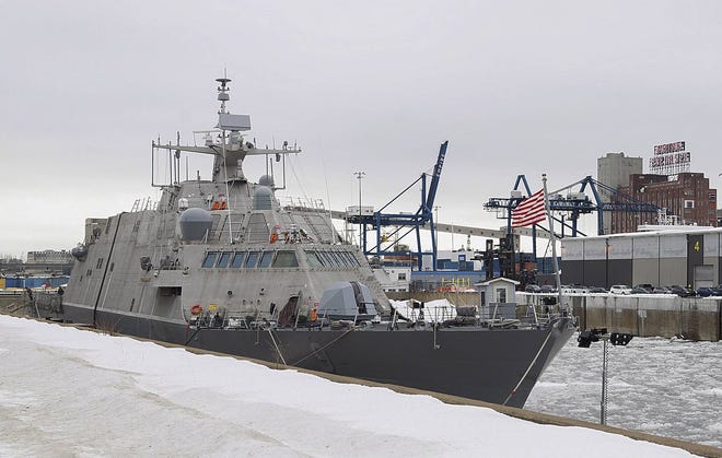 The USS Little Rock is moored in Montreal’s old port Sunday. The newly commissioned Navy littoral combat ship will spend the winter in Montreal after cold weather delayed its voyage to Mayport Naval Station. (The Canadian Press via AP)