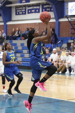 Highland's Marjani Onafowora shoots a layup off a fast break at Cherryville Monday night in a game rescheduled from last Friday. The Rams defeated the Ironmen and host Bessemer City Tuesday, while the Ironmen travel to Thomas Jefferson in Forest City. [Brian Mayhew/Special to The Gazette]