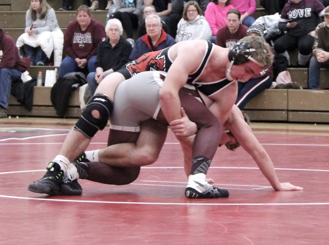 PortlandþÄôs Devin Miller works on an opponent during last weekþÄôs action. Miller claimed the title in the 160-pound weight class at the Ithaca Invitational Saturday. [Jeannie Gregory/Ionia Sentinel-Standard]