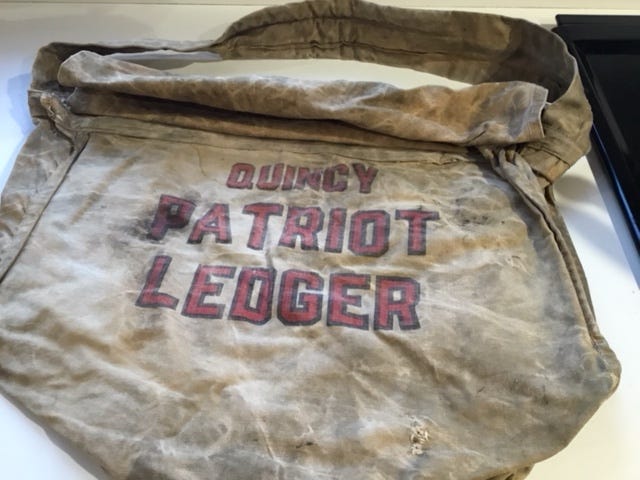 Ellen Fulton found this Patriot Ledger carrier bag on a shelf in a closet. Her husband Herb used it in Weymouth many years ago.