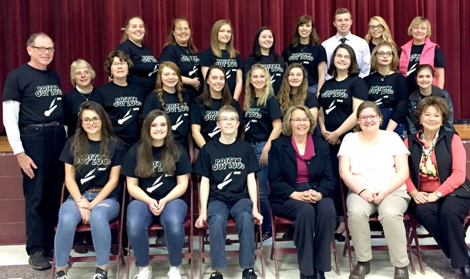 Junior Harry Harman placed first in the John Glenn High School’s sixth annual Poetry Out Loud contest on Jan. 21. Harman will travel to Stuart’s Opera House in Nelsonville, Ohio to compete in the state semifinal contest on Feb. 17. Pictured is everyone involved in Sunday’s contest. Front row: Gabrielle Lemon who placed third, Kirsten Stinson who placed second, Harman, judges Dr. Barb Hansen, Katie Gotschall, and Carol Wilcox-Jones. Second row: Accuracy judge Doug Perry, tabulator Sue Messino, accuracy judge Kim Van Wey, contestants Mateya Townsend, Iris Atkins, Jenna Rice, Alaina Williams, Elizabeth Janczarek, Lilly Runyan, and Daphne Woodmansee. Back row: Assistant Brenna Poulos, contest coordinator Teri Poulos, assistants Selena Tindall, Laila Richards, emcee Pamela Losego, sound technician Blake Cooper, prompter Sydney Johnson, and contest coordinator Mary Ann DeVolld.