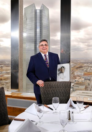 Petroleum Club Executive Director V.J. Vazirvar said his club's grand panoramic views of downtown Oklahoma City continue to draw diners and event planners. [PHOTO BY JIM BECKEL, THE OKLAHOMAN]