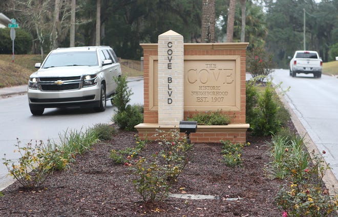 Vehicles are driven past the new Cove Blvd. sign on Wednesday in Panama City. [PATTI BLAKE/THE NEWS HERALD]