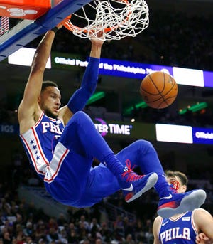 Philadelphia 76ers guard Ben Simmons dunks during the second half on the team's NBA basketball game against the Chicago Bulls, Wednesday, Jan. 24, 2018, in Philadelphia. The 76ers won 115-101. (AP Photo/Laurence Kesterson)