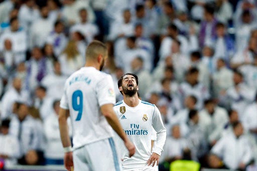 Real Madrid's Francisco Roman "Isco" reacts fter Leganes scored a goal during of the Spanish Copa del Rey quarterfinal second leg soccer match between Real Madrid and Leganes at the Santiago Bernabeu stadium in Madrid, Wednesday, Jan. 24, 2018. Leganes won 2-1. (AP Photo/Francisco Seco)