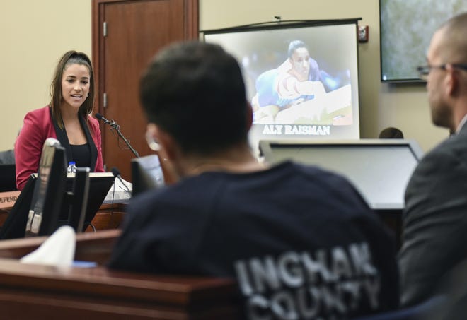 Former Olympian Aly Raisman confronts Larry Nassar in Circuit Judge Rosemarie Aquilina's courtroom on Friday during the sentencing hearing for the former sports doctor, who pled guilty to multiple counts of sexual assault. [Lansing State Journal via AP / Matthew Dae Smith]