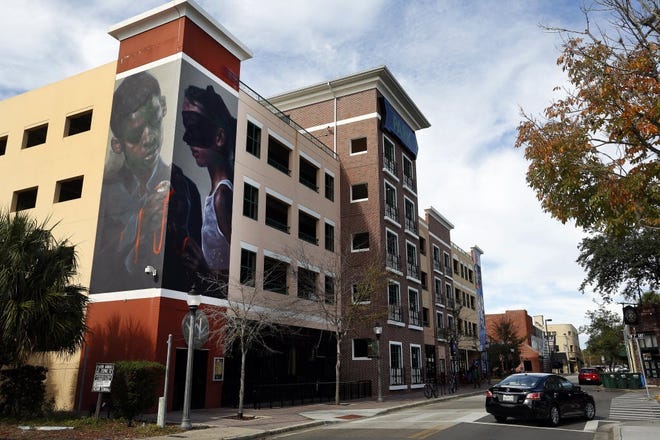 A mural is shown on the parking garage on Southwest Third Street in Gainesville. [Gainesville Sun, File]