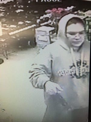 Police are looking for a woman who used a stolen credit card at a northwest Oklahoma City liquor store.