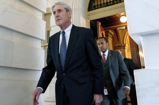In this June 21, 2017, photo, former FBI Director Robert Mueller, the special counsel probing Russian interference in the 2016 election, departs Capitol Hill following a closed door meeting. [ASSOCIATED PRESS FILE PHOTO]