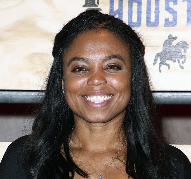 FILE - In this is a Feb. 3, 2017, file photo Jemele Hill attends ESPN: The Party 2017 in Houston, Texas. ESPN says the outspoken "Sportscenter" anchor is leaving that role to write for a company web site and do occasional on-air commentary. Hill attracted attention last year and was briefly suspended for opinionated messages on social media, including a reference to President Donald Trump as a "white supremacist." The network said Friday, Jan. 26, 2018, that Hill had asked to be taken off the 6 p.m. weekday edition of ESPN's sports news show. (Photo by John Salangsang/Invision/AP, File)