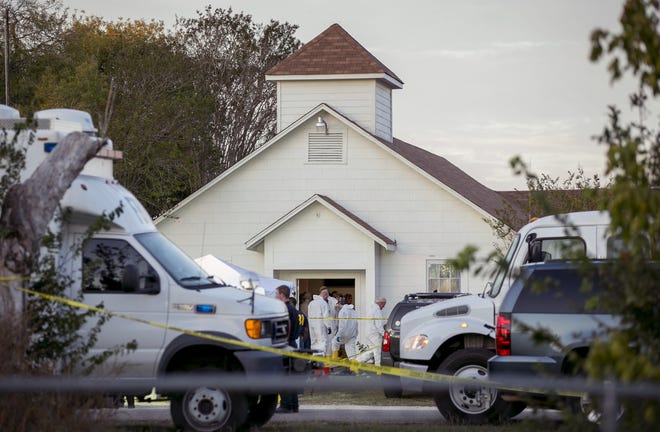 Investigators work at the scene of a mass shooting at the First Baptist Church in Sutherland Springs, Texas, on Nov. 5, 2017. A man opened fire inside of the church in the small South Texas community, killing more than 20 people. [Jay Janner/Austin American-Statesman file via AP]