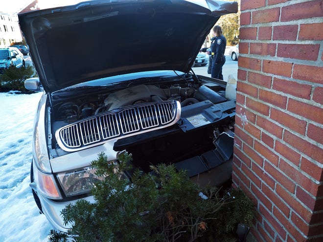 Portmsouth Police Officer Lynn Thomas at the scene of the Immaculate Conception Church in Portsmouth Friday afternoon, after a large sedan crashed into the side of the building sending one person to the hospital.

[Rich Beauchesne/Seacoastonline]