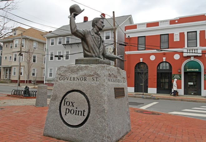 A statue of Fox Point native George M. Cohan — poet, lyricist, and composer — sits at the corner of Governor and Wickenden streets in Providence. [The Providence Journal / Steve Szydlowski]