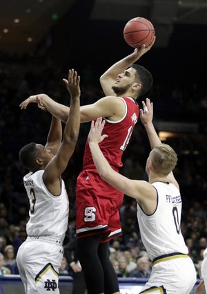 N.C. State sophomore Omer Yurtseven has been one of the ACC's most improved players this season. Over the last seven games – four of which have come against nationally ranked ACC teams – Yurtseven has averaged 17.3 points and 5.9 rebounds for a Wolfpack frontcourt that could cause trouble for UNC today. [MICHAEL CONROY/AP FILE PHOTO]