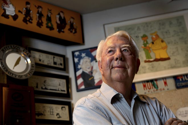 FILE - In this Aug. 16, 2010 file photo, Mort Walker, the artist and author of the Beetle Bailey comic strip, stands in his studio in Stamford, Conn. On Saturday, Jan. 27, 2018, a family member said the comic strip artist has died. He was 94. [AP Photo/Craig Ruttle]