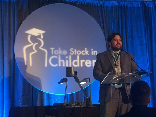 Anthony Ritter received the 2018 Take Stock in Children (TSIC) Alumni of the Year award for his commitment toward the program and for his achievements as an educator. [SUBMITTED]