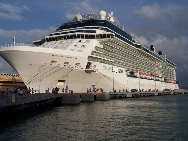 This June 13, 2017 photo shows Celebrity Cruises’ Equinox at dock in San Juan, Puerto Rico. The ship carries 2,850 passengers, features a real grass lawn, Sky Observation Lounge and specialty restaurants like Tuscan Grille and Silk Harvest. (Joe Kafka via AP)