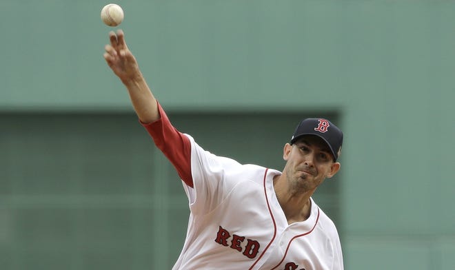 Rick Porcello is a big fan of his new pitching coach. [Steven Senne/The Associated Press]