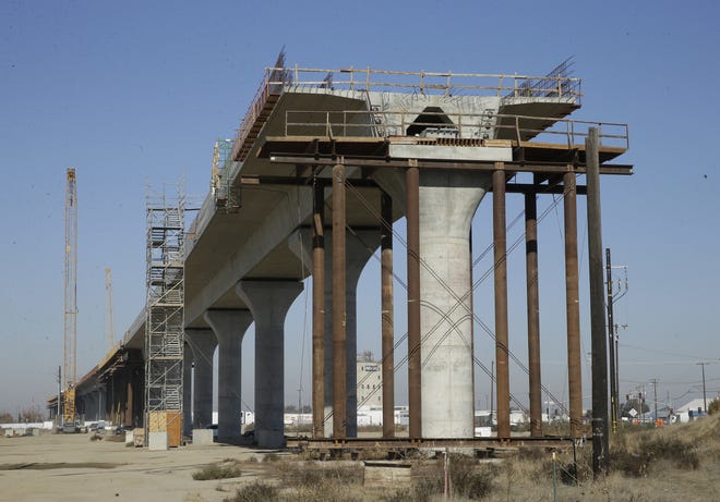 A bipartisan team of lawmakers are seeking a formal audit of California's high-speed rail project following a nearly $3 billion jump in costs. [Rich Pedroncelli, Associated Press]