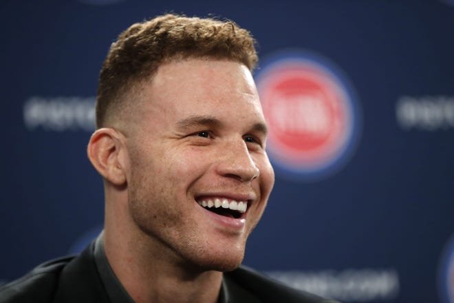 Detroit Pistons forward Blake Griffin smiles while talking about his trade from the Los Angeles Clippers a press conference Wednesday. Griffin said he was excited to play for a team that wanted him. [Paul Sancya/The Associated Press]