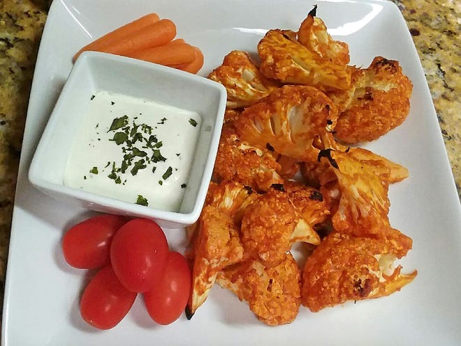 Sriracha cauliflower bites pack all kinds of flavor without all the calories. [Submitted]
