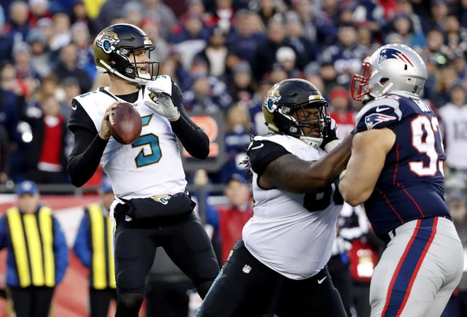 Jaguars quarterback Blake Bortles drops back to throw a pass against the New England Patriots during the AFC Championship Game. [AP Photo/Winslow Townson]