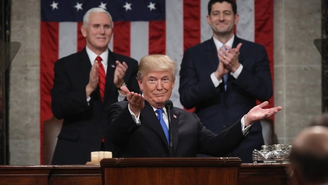 U.S. President Donald J. Trump delivers the State of the Union address as U.S. Vice President Mike Pence (L) and Speaker of the House U.S. Rep. Paul Ryan (R-WI) (R) look on in the chamber of the U.S. House of Representatives January 30, 2018 in Washington, DC. This is the first State of the Union address given by U.S. President Donald Trump and his second joint-session address to Congress. (Photo by Win McNamee/Getty Images)