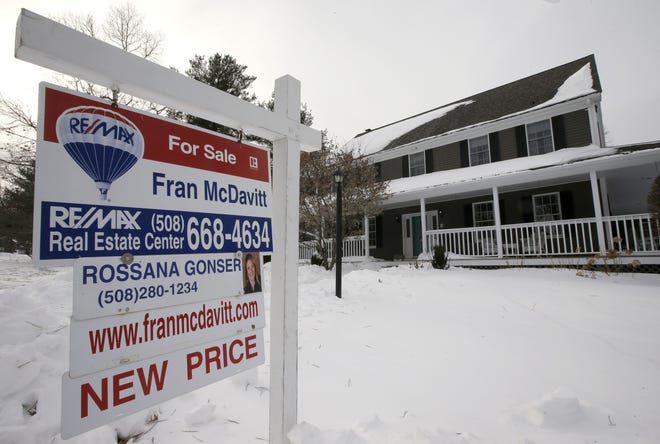 An existing home is for sale in Walpole, Massachusetts. Before you start perusing real estate websites looking for your dream home, you first need to get serious about your money. [AP Photo/Steven Senne, File]