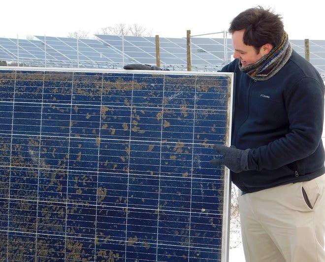 Solstice Field Operations Manager Sean Hutton discusses the solar panels at the Baldwin Solar Farm in the Town of Baldwin Thursday. [STEPHEN BORGNA/THE LEADER]