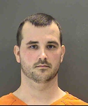 Dennis Pomroy, 32, has been arrested and accused of downloading child pornography while on duty as a security guard at the Venetian Golf & River Club guard house. [Provided by Sarasota County Sheriff's Office]