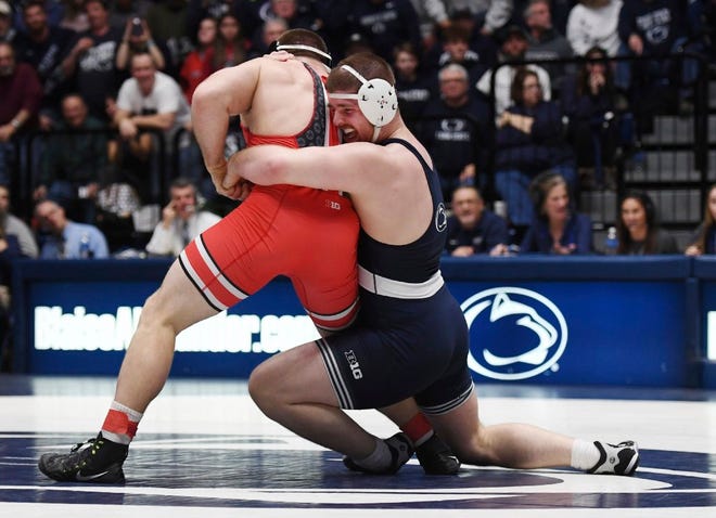 Penn State's Nick Nevills, right, proved a tough opponent for Ohio State's Kyle Snyder in State College, Pa., on Saturday. [Phoebe Sheehan/Centre Daily Times]