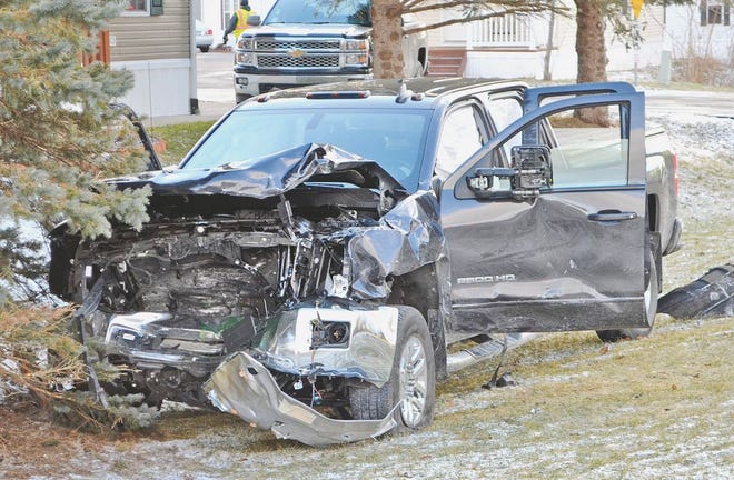 The driver of this Chevy Silverado hit the spinning Ford Fiesta broadside as it was pushed into its path.
