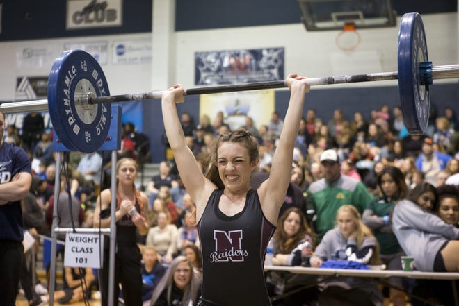 Navarre's Amiyah Carnall at the Class 2A state weight lighting tournament at Arnold High School in Panama City on Saturday. [JOSHUA BOUCHER/THE NEWS HERALD]