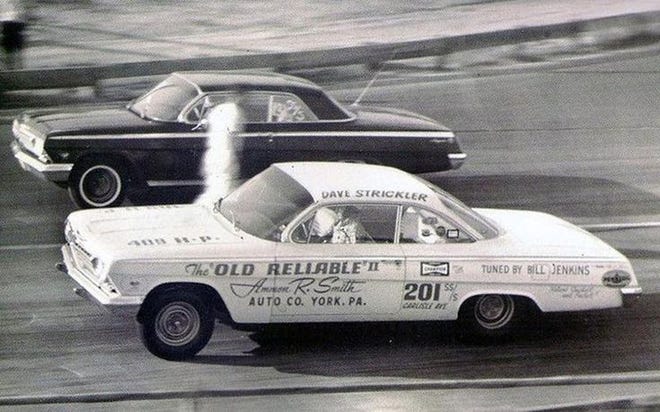Dave Strickler, in the famous “Old Reliable” 409 ’62 Chevy Belair “bubble top” was a main attraction at drag strips in the early 1960s match race wars. He’s shown here at Vineland Drag Strip racing a local driver in a ‘62 Impala 409 Chevy who was said to be Tom Urgo, my barber back in 1962. [Vineland Drag Strip/Bill Nocco Family]