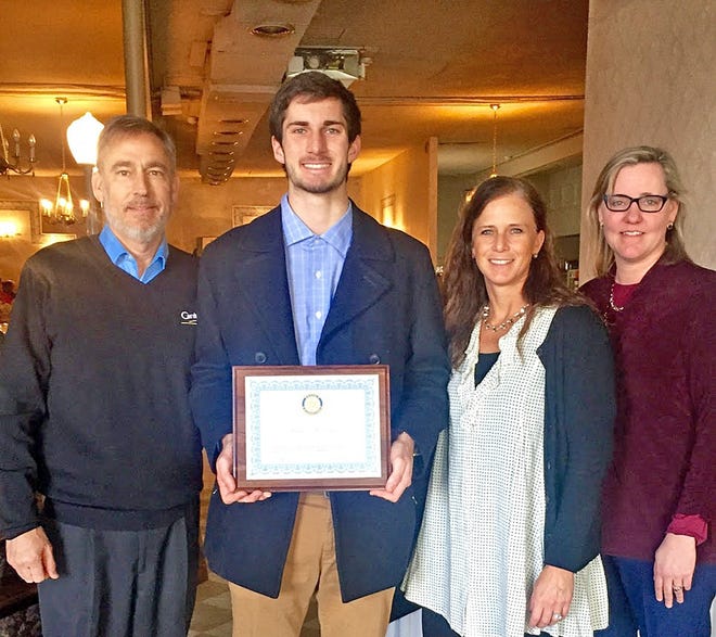 Jim Drews, Bryce Drews, Sonja Bindus and Hillsdale High School Principal Amy Goldsmith pose for a picture after Drews was named student of the month by the Hillsdale Rotary. [COURTESY PHOTO]