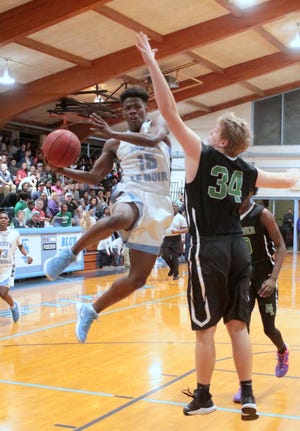 South Lenoir's Shamon Wooten goes up for a layup Tuesday night against North Lenoir. [Joseph Dixon / The Free Press]