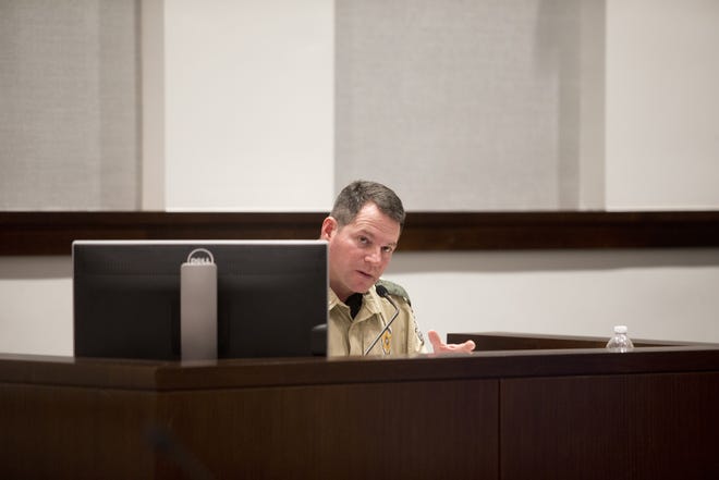 During trial Tuesday at the Bay County Courthouse, Florida Fish and Wildlife Conservation Commission officer David Brady tells jurors he was shot twice in an open-water gunfight. Samuel Reager is charged with attempted first-degree murder of an officer in the case. [JOSHUA BOUCHER/THE NEWS HERALD]
