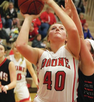 Boone senior Claire Sandvig reached a pair of milestones Tuesday night against Perry, scoring her 1,000th point and grabbing her 800th rebound. She also made her 322nd career block. Photo by Andrew Logue/News-Republican