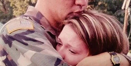 Daniel Blanton is seen saying goodbye to his wife, Ashley Blanton, before his deployment in 2004. [Special to The Star]