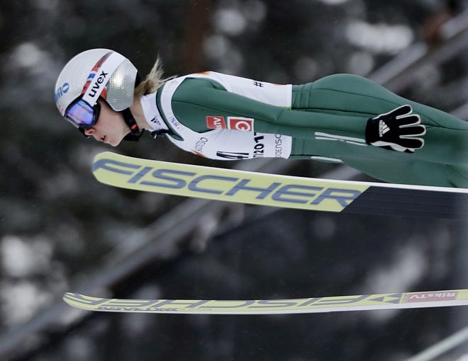 Norway's Maren Lundby jumps during the women's ski jumping qualification at the 2017 Nordic Skiing World Championships in Lahti, Finland. Lundby is a favorite for the gold medal favorite in women's ski jumping at the Pyeongchang Games. [AP Photo / Matthias Schrader, File]