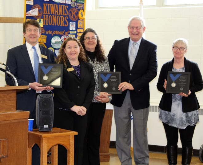 Recipients of the Walter Zeller Award include Craig Connor and Delesha Padula of CNB, Marcy Boone and David Pope of Powers Clothing and Elizabeth Anderson of BPU. [NANCY HASTINGS PHOTO]