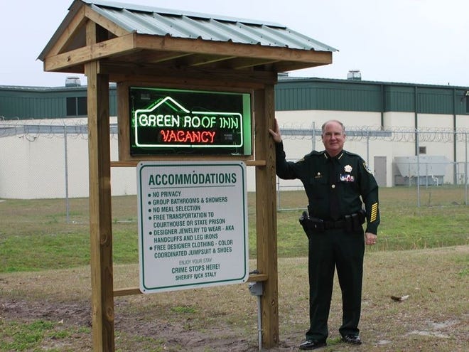 Flagler County Sheriff Rick Staly unveils new signage Thursday at the Flagler County Detention Facility in Bunnell. [Photo provided/FCSO]