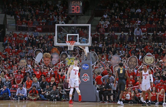 Fans fill up Value City Arena for a game between Ohio State and Iowa. [Barbara J. Perenic/Dispatch]