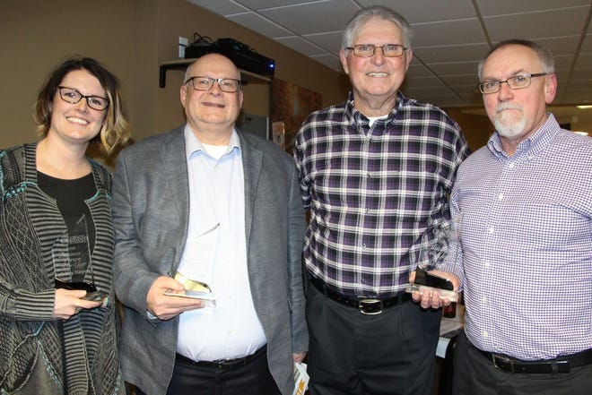 The recipients for the 2018 Canton Area Chamber of Commerce awards were Ashley Harper, Business Person of the Year; Ron Brown, Paul Vonderhaar Citizen of the Year; and Mike Sorrill, Educator of the Year. Pictured from left to right are Harper; Brown’s brothers Marty and Dick, who accepted the award on his behalf; and Sorrill.