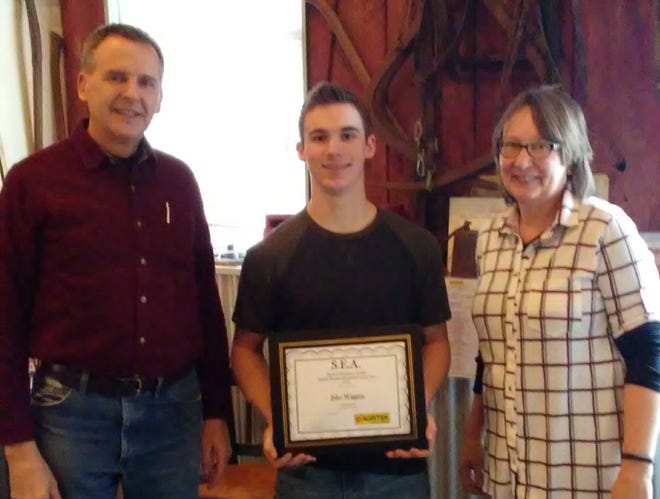 West Ottawa High School senior Jake Wiggins received the Student Employee of the Year award and a $500 scholarship from Agritek. Wiggins plans to enlist in the United States Army after graduation. [Contributed]